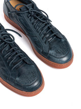 JP/DAVID: Sneakers Papua